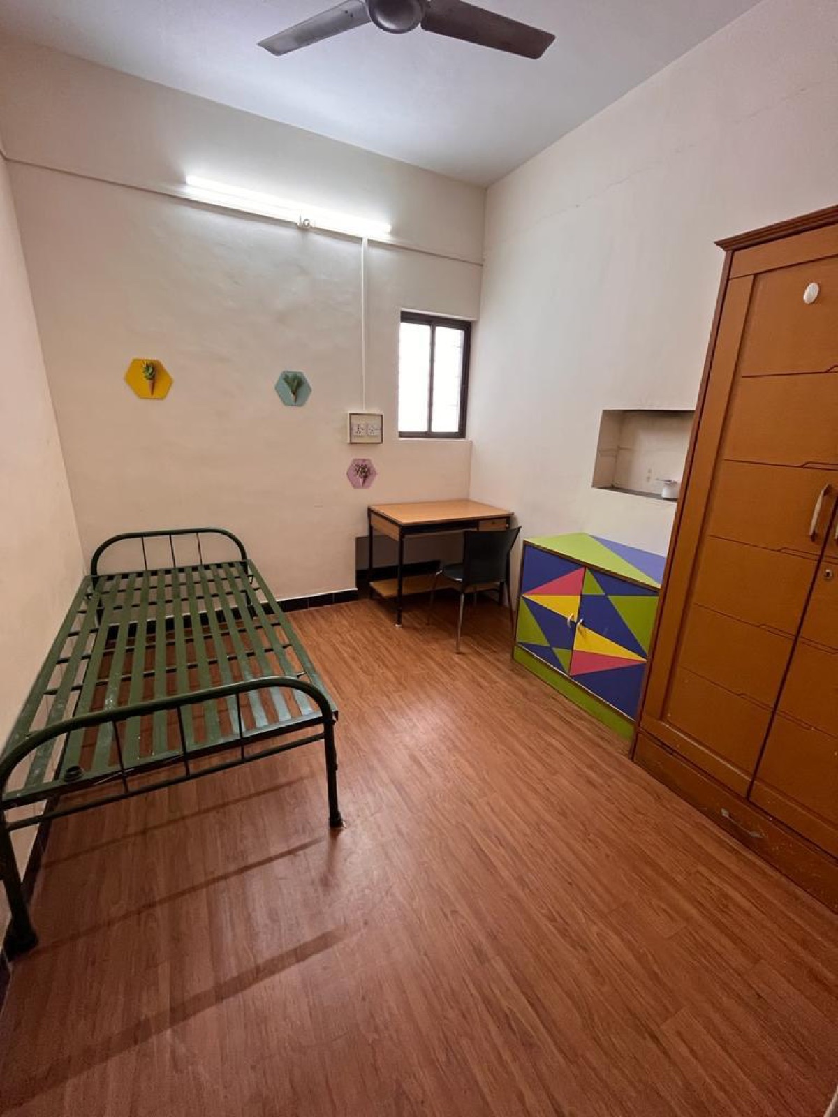 Room 2 — single-occupancy room with single bed, study table and cupboard